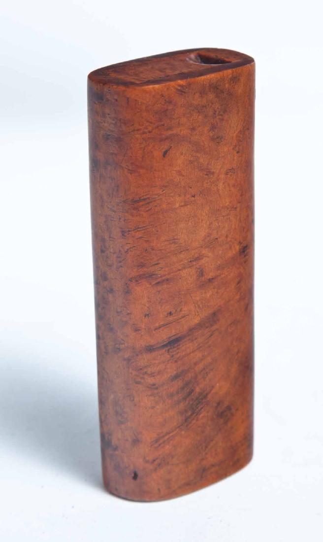 TALL BURL SNUFF BOX: Oval form with slide lid. Purchased from Garth's Auctions, Delaware, Ohio.