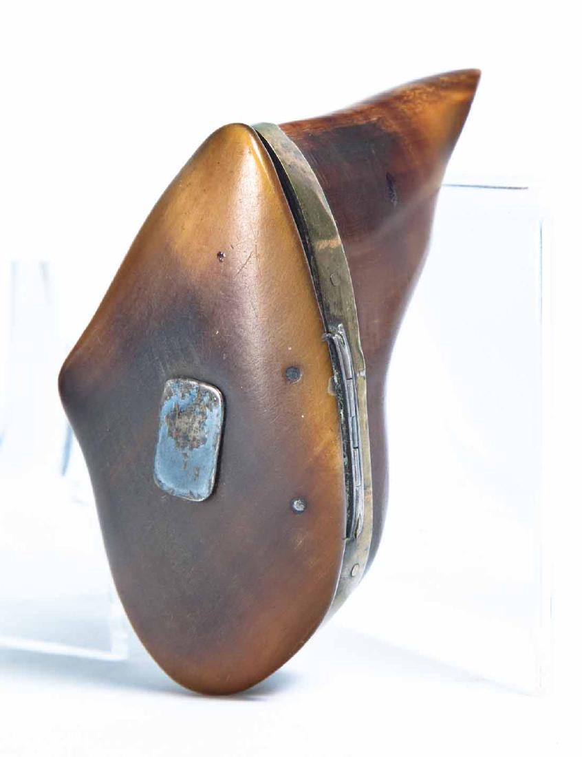 CARVED HOOF SNUFF BOX: Carved and polished with lid attached by brass collar and hinge. Inset brass name tag (blank) in center of lid. 2.5"h. 3 .25"w. 2"d.