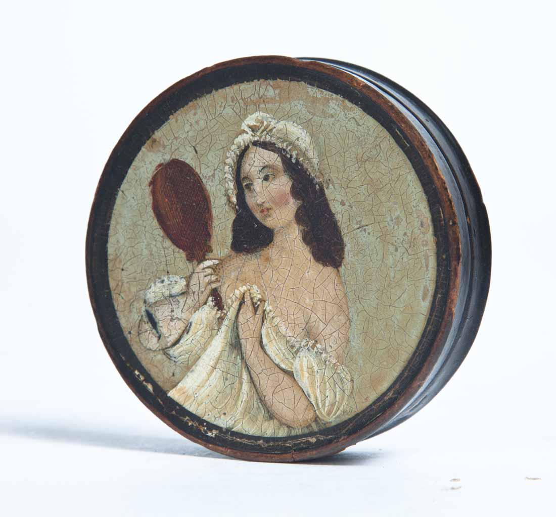 PAINT-DECORATED LACQUERWARE SNUFF BOX: Round with paint decoration on lid depicting a woman disrobing and holding a hand mirror. Purchased from Garth's Auctions, Delaware, Ohio. .75"h. 2.75"dia.