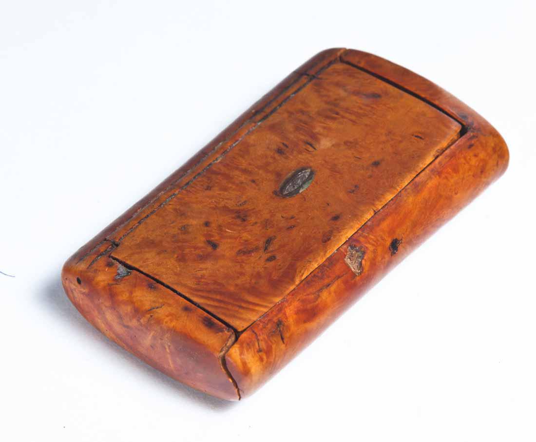 BURL SNUFF BOX: Rectangular with rounded ends and hinged lid. .75"h. 3.75"w. 2.25"d.
