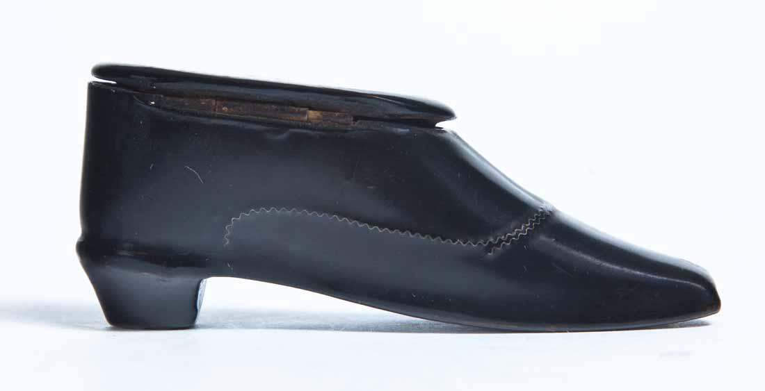 LACQUERWARE SHOE SNUFF BOX: Heeled shoe with hinged lid. Shoe accents include stitching, buttons and tacks in heels. 1.25"h. 3.25"w. 1"d.