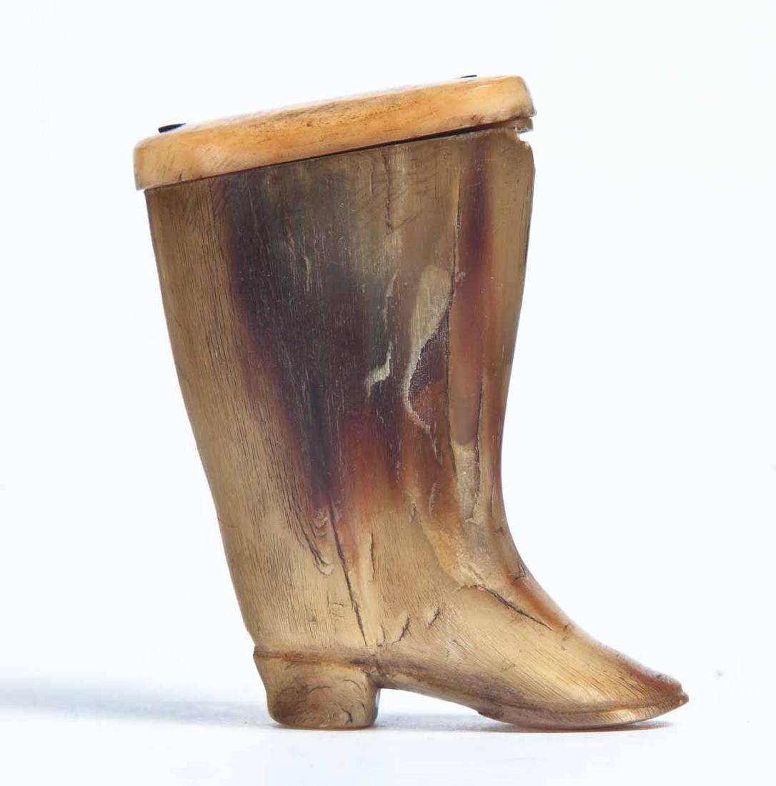HORN BOOT SNUFF BOX: Carved horn with separate lid. 2.5"h. 1.5"w. .75"d.