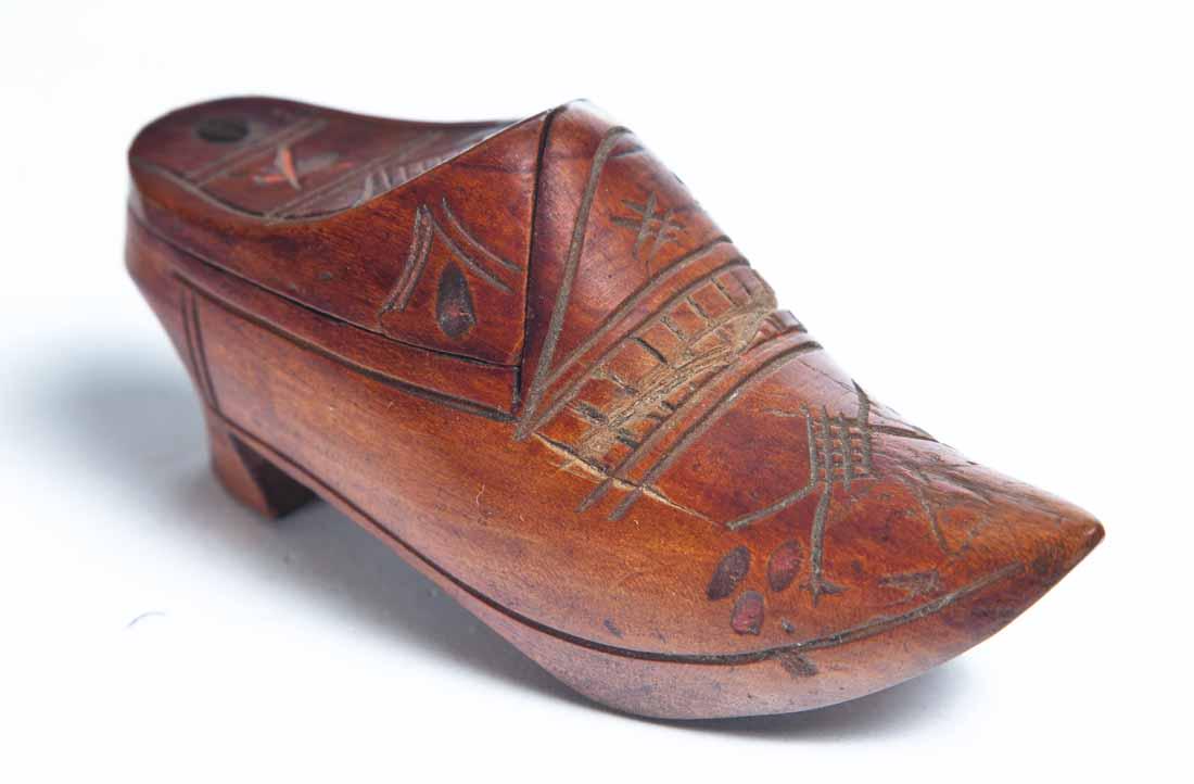 WOOD DUTCH SHOE SNUFF BOX: Heeled with swivel lid and carved accents. 1 .75"h. 4"w. 1.25"d.