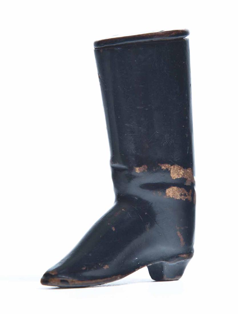 LACQUERWARE BOOT SNUFF BOX: Heeled boot with a hinged lid. 2 .75"h. 2"w. .5"d.