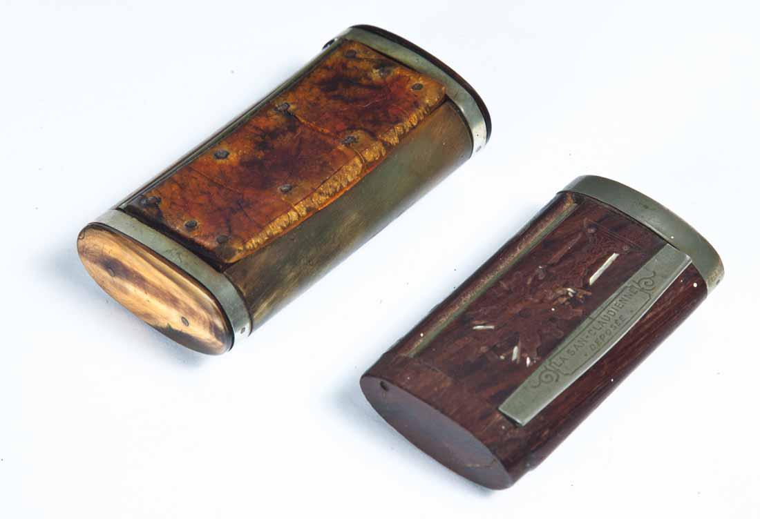 TWO SNUFF BOXES: One wood with embossed lid and "La San - Claudienne, Deposee". 3"w. One horn with unusual hinged lid. 3.5"w.