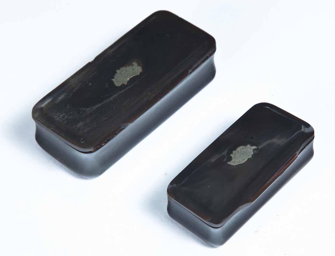 TWO HORN SNUFF BOXES: Both rectangular with hinged lids and central inlay. 2.5"w. 3.25"w.