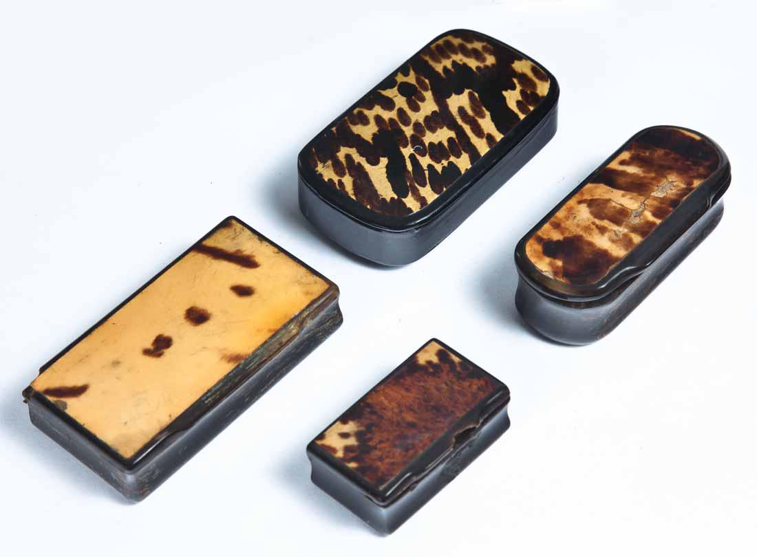 FOUR SNUFF BOXES: Two carved horn, two black lacquerware. All with tortoiseshell veneer lids. 2"w - 3.25"w.