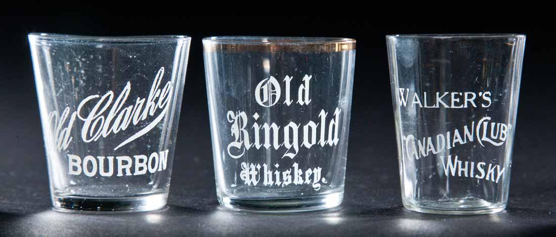 3 PRE-PROHIBITION SHOT GLASSES: Old Clarke Bourbon, Old Ringold Whiskey, and Walker's Canadian Club Whiskey. 2.25" high.