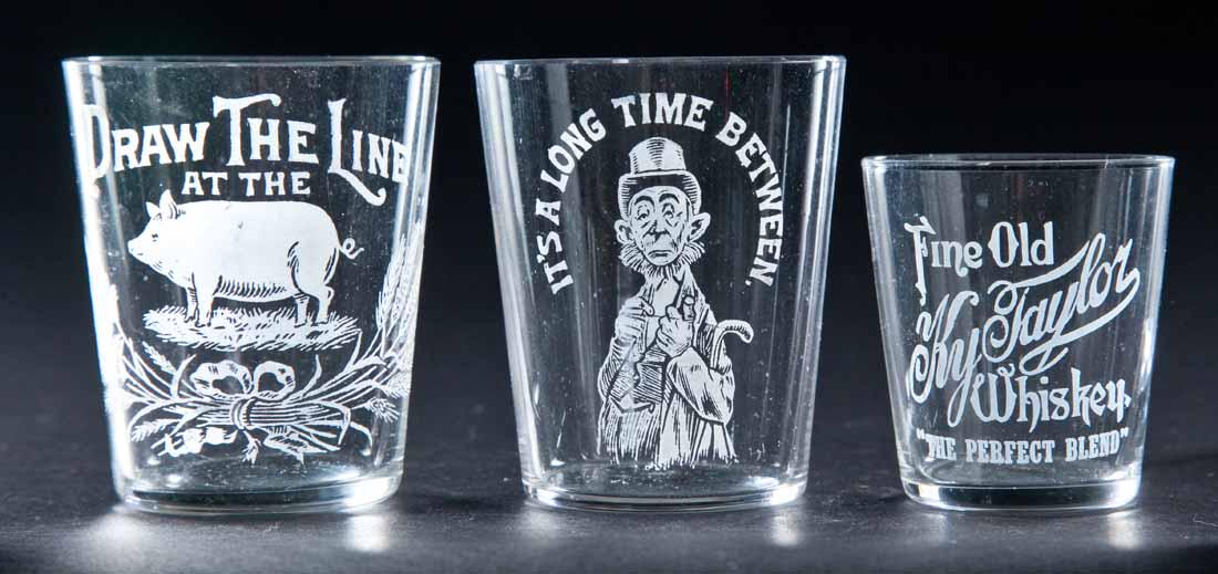 3 PRE-PROHIBITION SHOT GLASSES: Fine Old KY Taylor, Draw the Line at the [hog], and It's a Long Time Between. 2", 2.75", and 2.75" high.