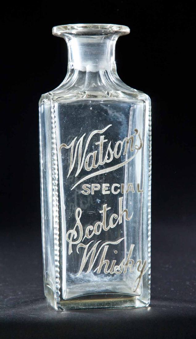 ENAMELED LABEL SCOTCH WHISKEY BOTTLE: Colorless square pre-Prohibition bottle with cut corners and label for "Watson's Special Scotch Whiskey". 8.5"h.