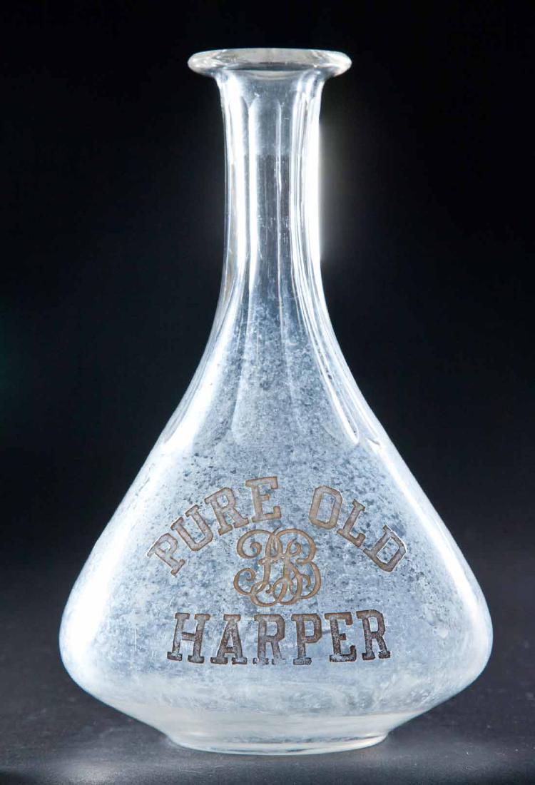 ENAMELED LABLE BAR BOTTLE: Colorless pre-Prohibition bottle with flared base, paneled neck and label for "Pure Old Harper". 9"h.