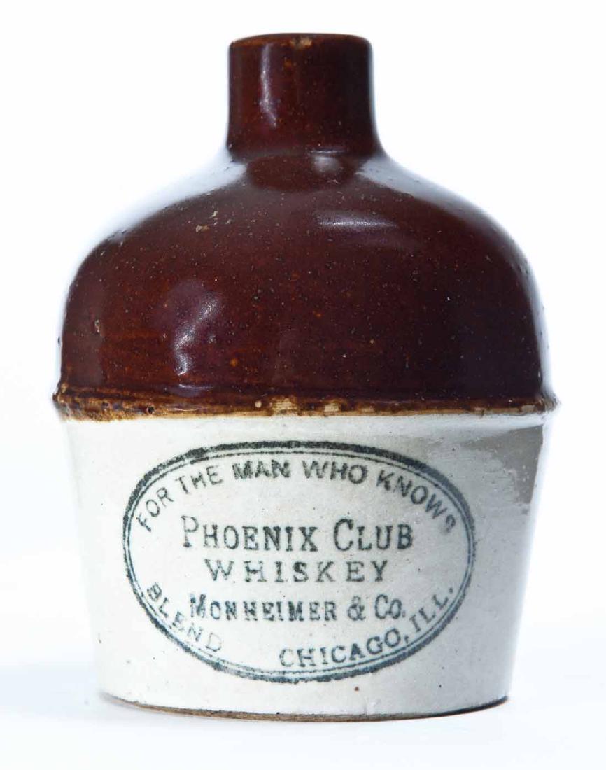 CHICAGO, ILLINOIS MINIATURE ADVERTISING JUG: Bicolor glaze with stamped advertisement "PHOENIX CLUB WHISKEY" and "FOR THE MAN WHO KNOWS." 4.25" high.