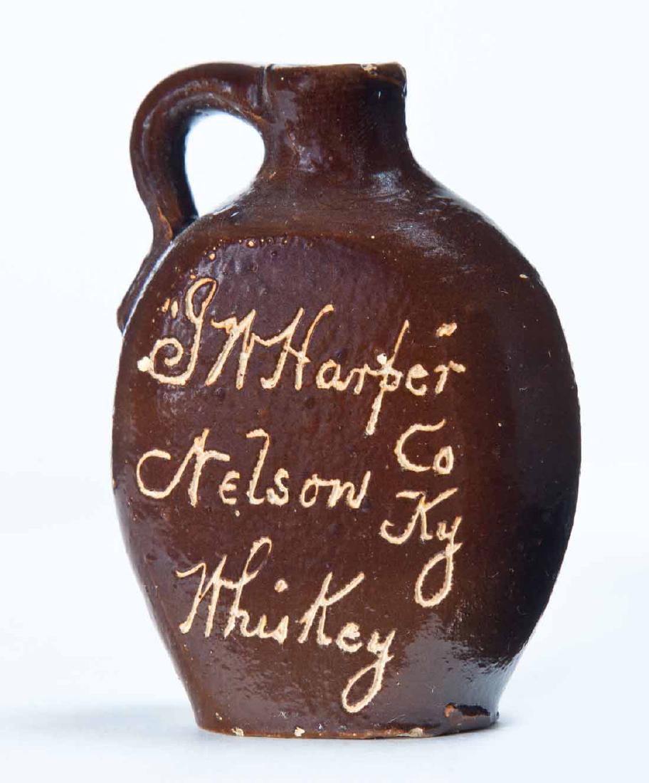 NELSON COUNTY, KENTUCKY MINIATURE ADVERTISING JUG: Scratch-decorated advertisement "J.W. Harperâ€¦Whiskey." 3" high.