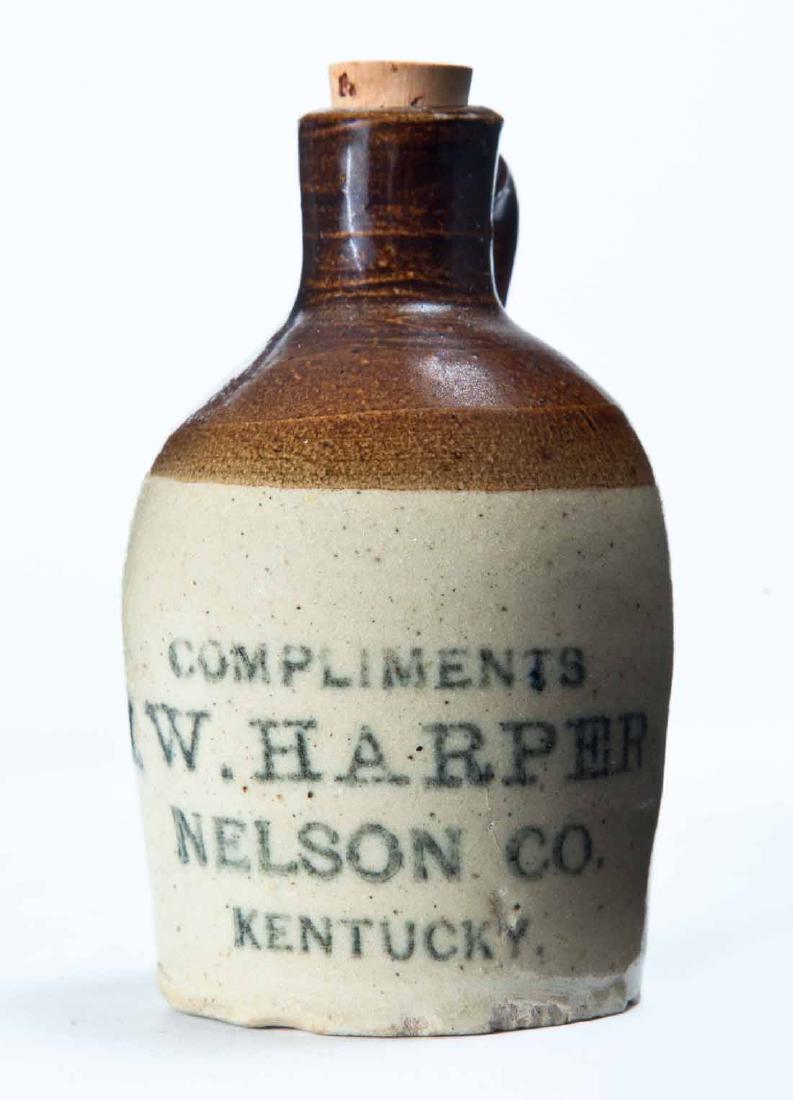 NELSON COUNTY, KENTUCKY MINIATURE ADVERTISING JUG: Bicolor glaze and stamped advertisement "COMPLIMENTS OF I.W. HARPERâ€¦" 3.25" high.