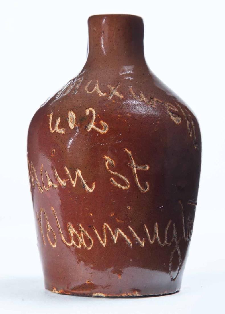 BLOOMINGTON, ILLINOIS MINIATURE ADVERTISING JUG: Scratch-decorated advertisement "F.J. Maxwell 602 Main St. Bloomington, Ill." 3.25" high.