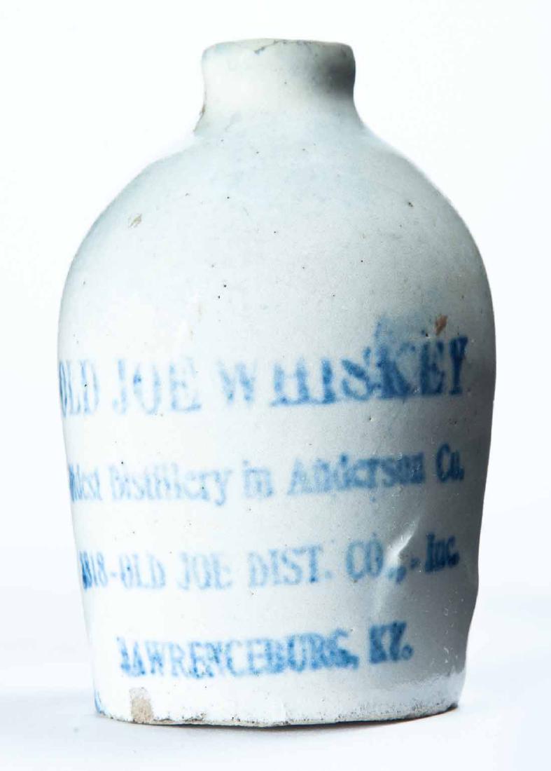 LAWRENCEBURG, KENTUCKY MINIATURE ADVERTISING JUG: White glaze and stamped advertisement "OLD JOE WHISKEY Oldest Distillery in Anderson Coâ€¦" 3.25" high.