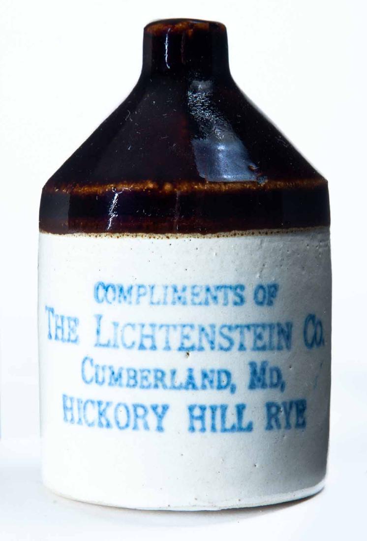 CUMBERLAND, MARYLAND MINIATURE ADVERTISING JUG: Bicolor glaze and stamped advertisement "COMPLIMENTS OF THE LICHTENSTEIN COâ€¦" 3.5" high.