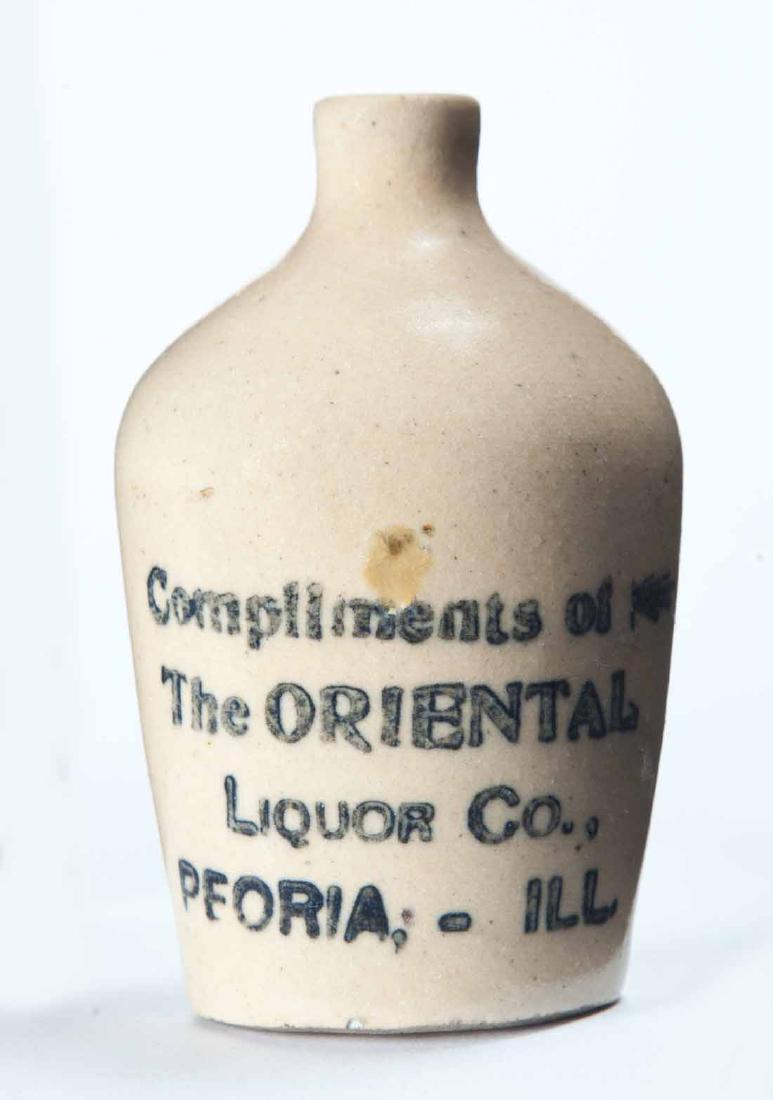 PEORIA, ILLINOIS MINIATURE ADVERTISING JUG: Cream glaze and stamped advertisement "Compliments of The ORIENTAL LIQUOR COâ€¦" 3" high.