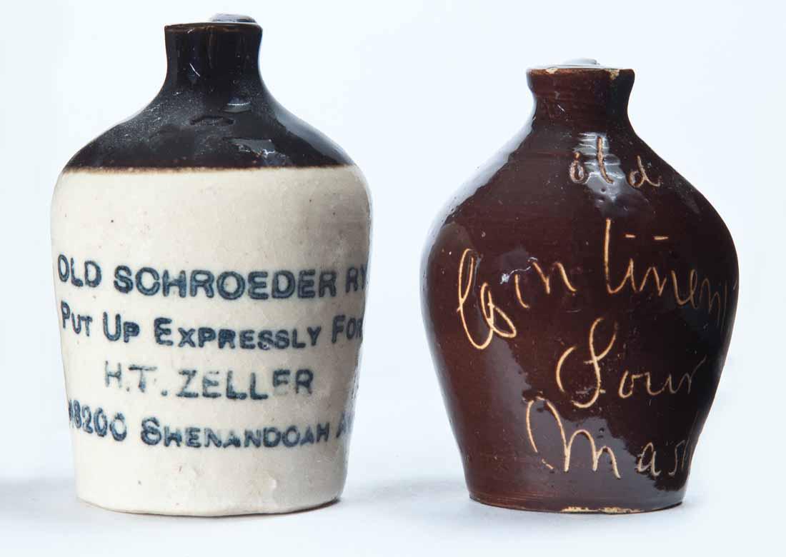 2 MINIATURE ADVERTISING JUGS: Bicolor glaze with stamped advertisement "OLD SCHROEDER RYE PUT UP EXPRESSELY FOR H.T. ZELLER 3200 SHENANDOAH AVE." and scratch-decorated advertisement "Old Continental Sour Mash." 3.25" and 3" high.