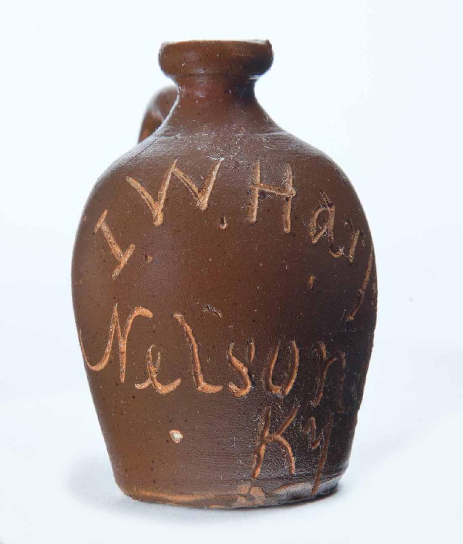 NELSON COUNTY, KENTUCKY MINIATURE ADVERTISING JUG: Scratch-decorated advertisement "I.W. HARPERâ€¦" 2.75" high.