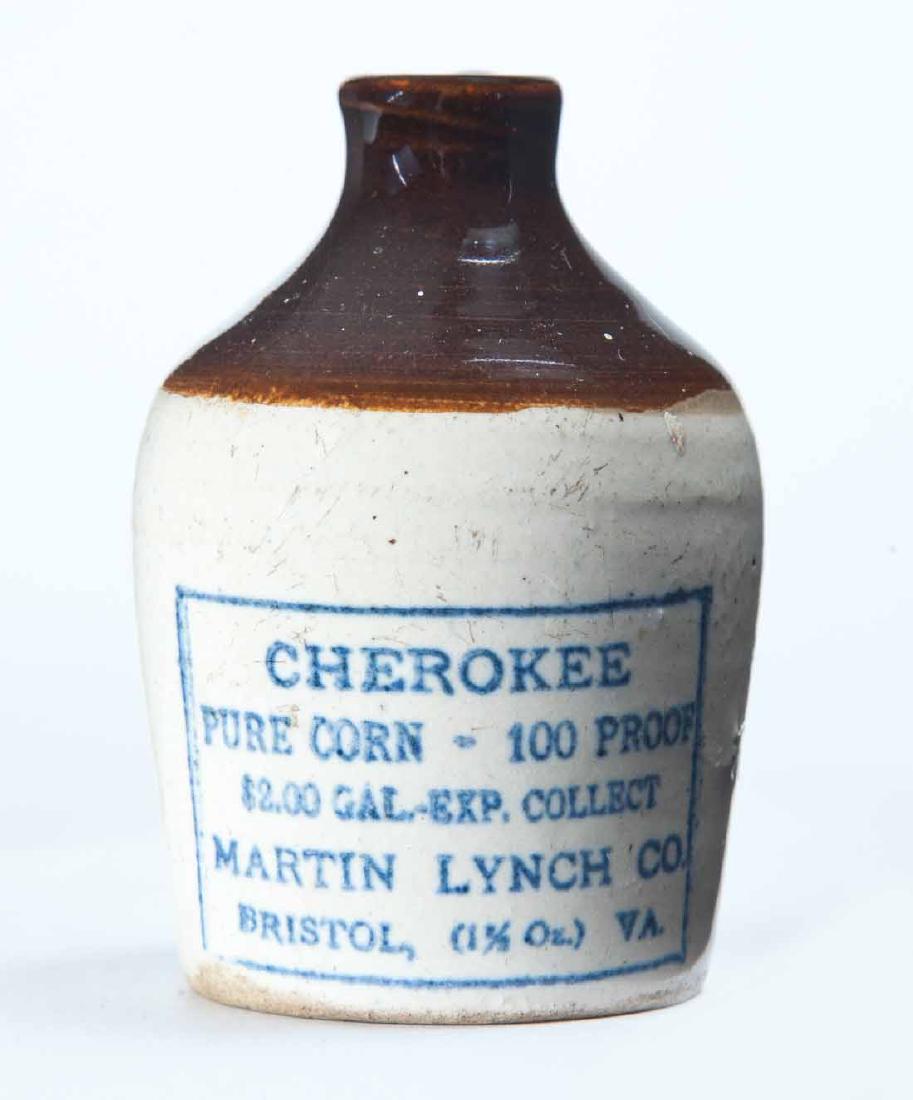 BRISTOL, VIRGINIA MINIATURE ADVERTISING JUG: Bicolor glaze and stamped advertisement "CHEROKEE PURE CORN 100 PROOFâ€¦" 3" high.