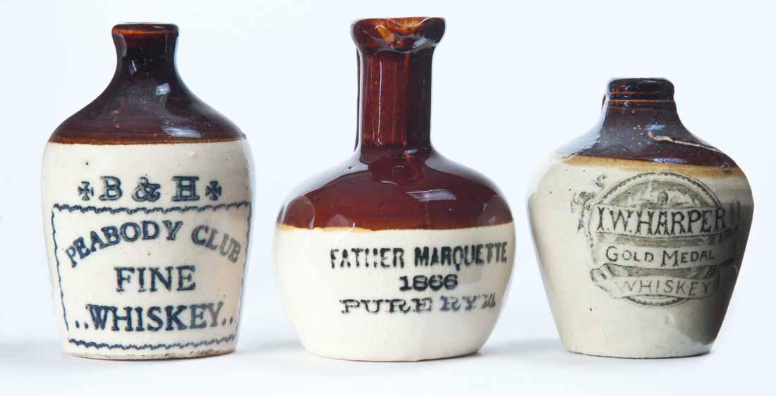 3 MINIATURE ADVERTISING JUGS: All bicolor glaze, includes "B&H PEABODY CLUB FINE WHISKEY," "I.W. HARPER GOLD MEDAL WHISKEY," and "FATHER MARQUETTE 1866 PURE RYE." 3", 2.75", and 3.25" high.