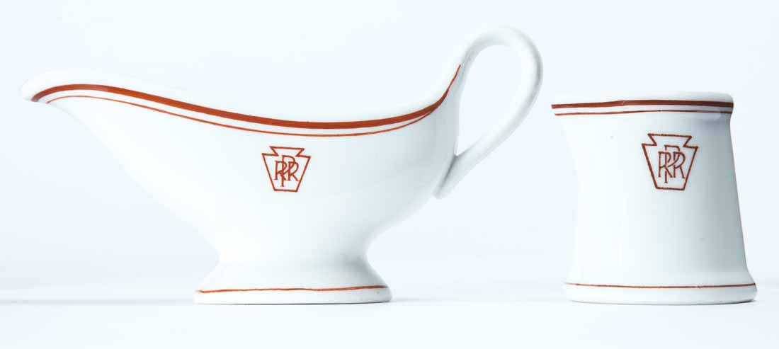 TWO PIECES PENNSYLVANIA RAILROAD DINING CAR CHINA: "Keystone" pattern by Lamberton China. Handleless cream pitcher. 2.25"h. Small sauce or gravy boat. 6"w.