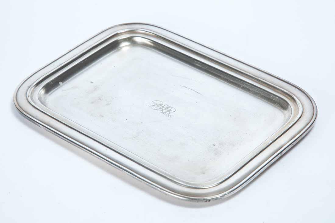 PENNSYLVANIA RAILROAD SILVERPLATE TRAY: Rectangular with engraved script "PRR" in center. Made by "International Silver". 10.75"w. 7.75"d.