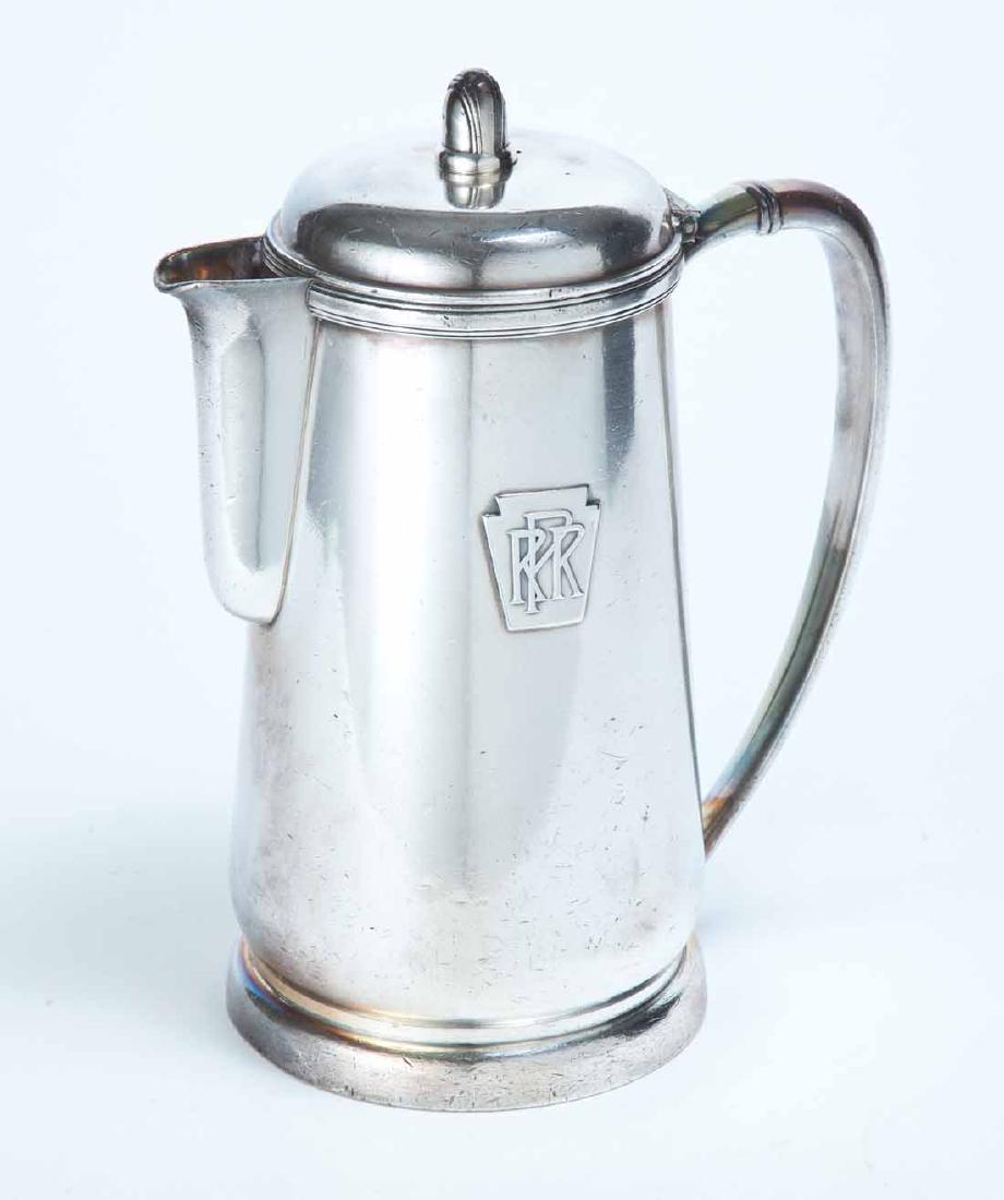 PENNSYLVANIA RAILROAD SILVERPLATE COFFEE POT: "54 ounce" with Keystone and "PRR" on front. Made by "International Silver". 10"h.