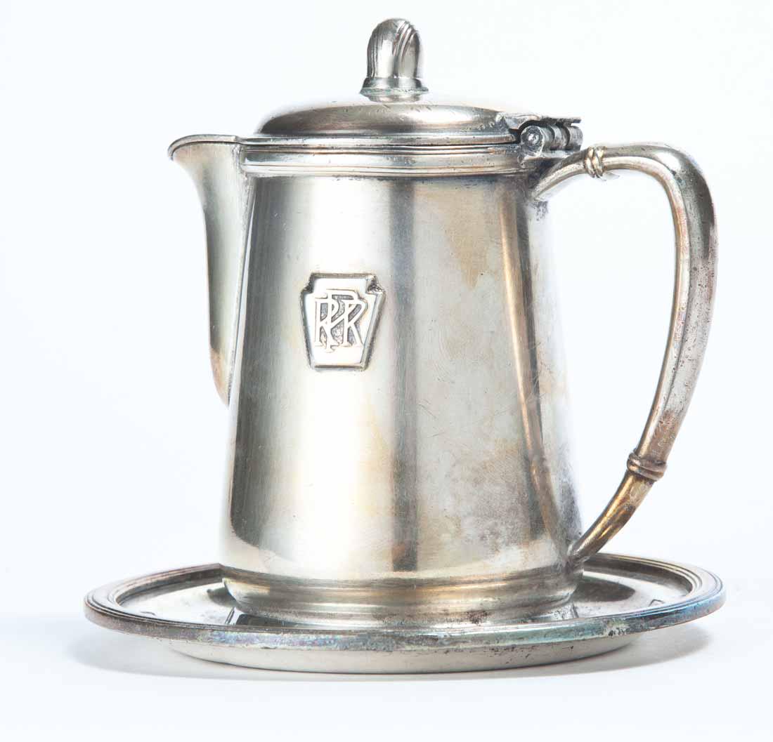 PENNSYLVANIA RAILROAD SILVERPLATE INDIVIDUAL MILK: With attached undertray. Keystone with "PRR" on front. Made by "International Silver". 5"h.