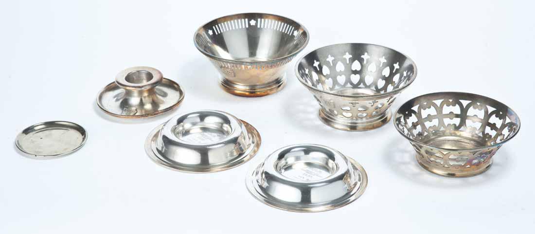 SEVEN PENNSYLVANIA RAILROAD SILVERPLATE DINING CAR: Group includes two lemon bowls with pierced sides, one frame for a bowl, two ashtrays and one candlestick holder. All marked wit some form of "PRR". Various makers. Also included in the lot is a silve