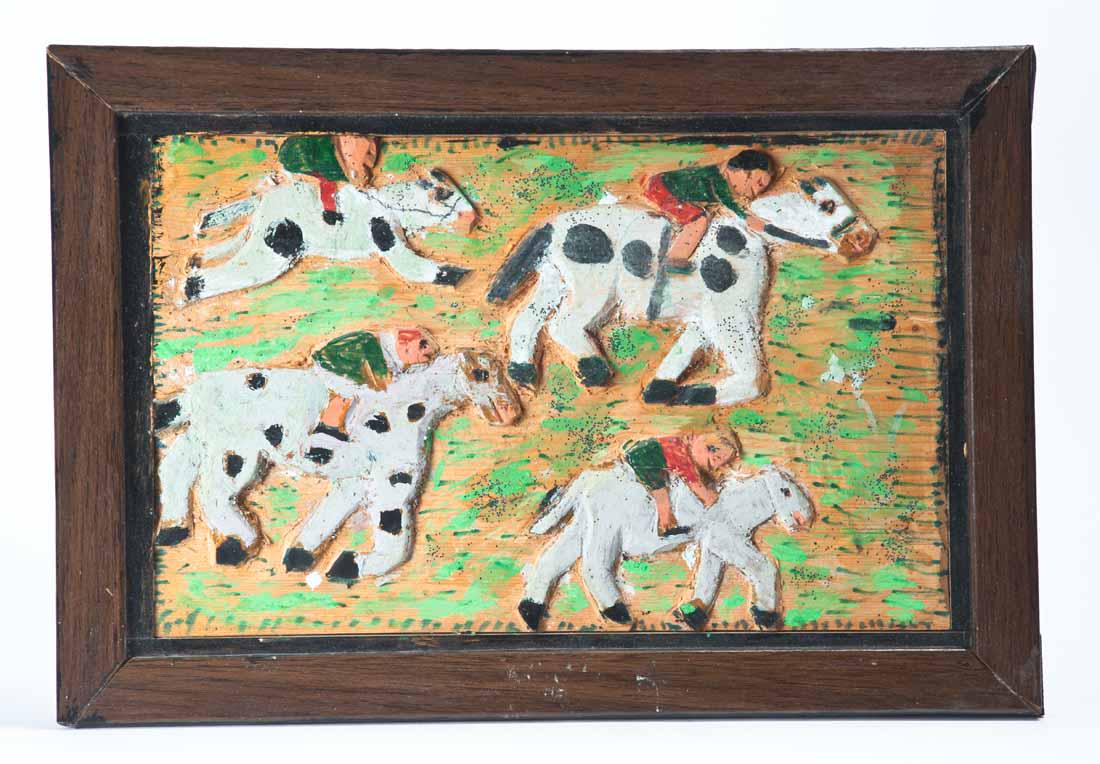 ELIJAH PIERCE (OHIO, 1892-1984), "HORSE RACING" CARVED: Signed and dated 1980 on the back. Depiction of a horse race, with glitter accents and original as-made frame. Ex Columbus Museum of Art (retains CMA property label on verso). 12.125" high, 17.5" wide