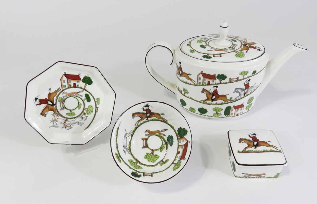FOUR PIECES OF WEDGWOOD HUNTING SCENE CHINA: 20th century. Includes one 10" long teapot, one 2.5" square covered box, one 4" bowl, and one 5" diameter octagonal plate. This lot is eligible for pick-up or in-house shipping. Please contact us for 