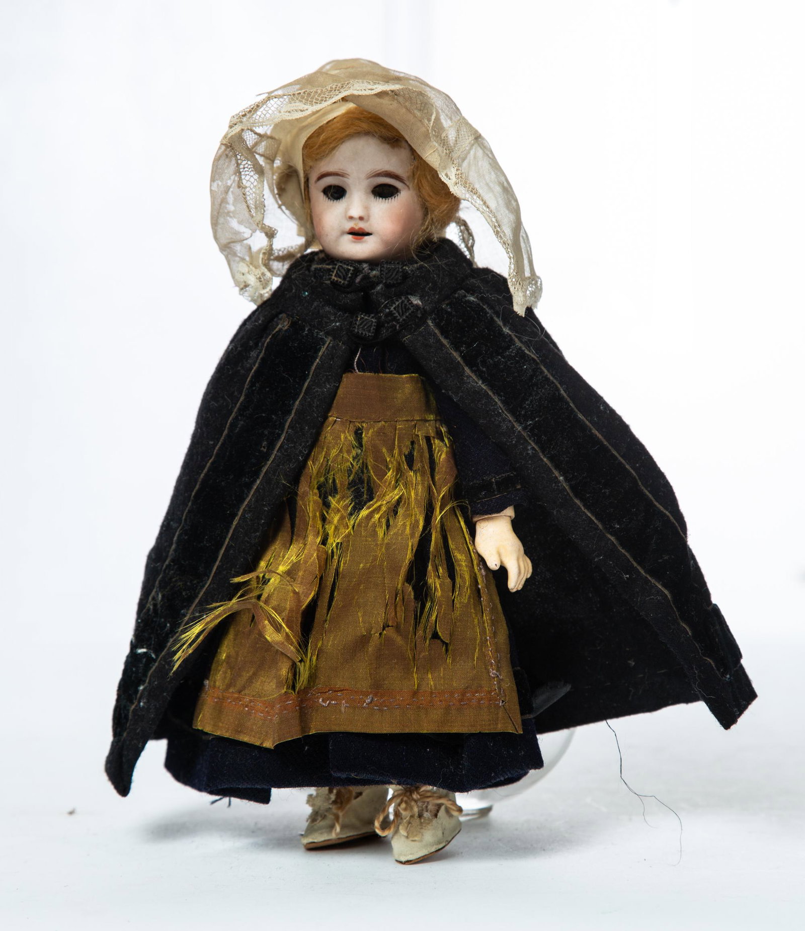 BEBE JUMEAU BISQUE HEAD DOLL: France, 19th century. Blond hair, sleep eyes and open mouth with four teeth. In original costume. Marked "S.F.B.J 301 Paris". 9.5" high. (K13)