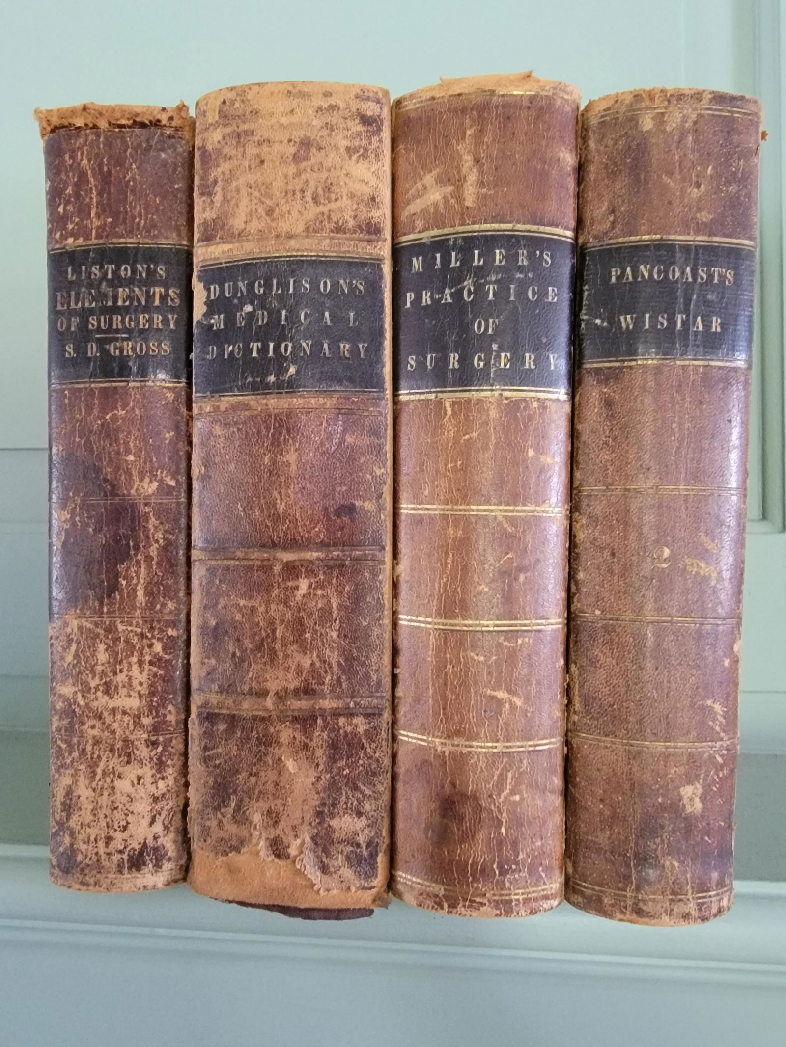 4 EARLY MEDICAL BOOKS: Includes Miller, The Practice of Surgery (Philadelphia: Blanchard and Lea, 1857); Wistar, System of Anatomyâ€¦volume 2 only (Philadelphia: Thomas, Cowperthwaite & Co., 1846); Liston, Elements of S