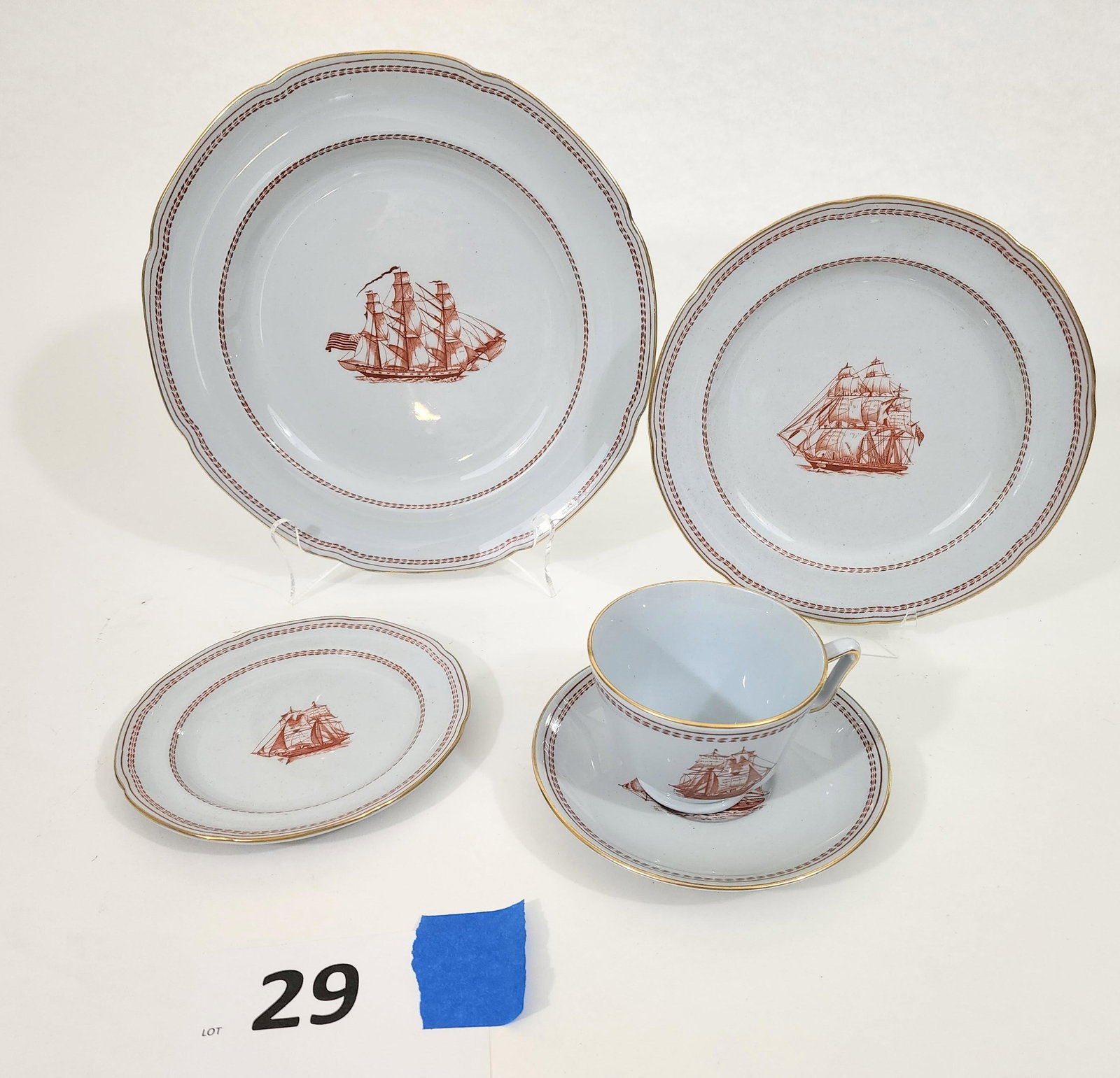 COLLECTION OF SPODE COPELAND "TRADE WINDS" CHINA: English, 20th century in a late 18th century-Chinese-export-style. 12 boxes, each appears to contain a place setting that includes cup/saucer, dessert plate, lunch plate, and dinner plate.