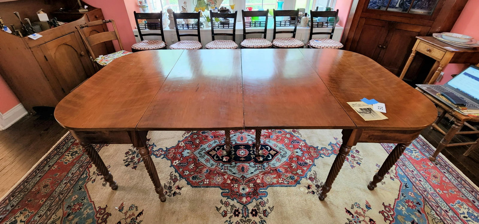 SHERATON DINING TABLE: American, 1820-1830, mahogany. Two-part table with beautifully turned legs. 28" high, 42.25" wide, 42" long (84" fully extended).