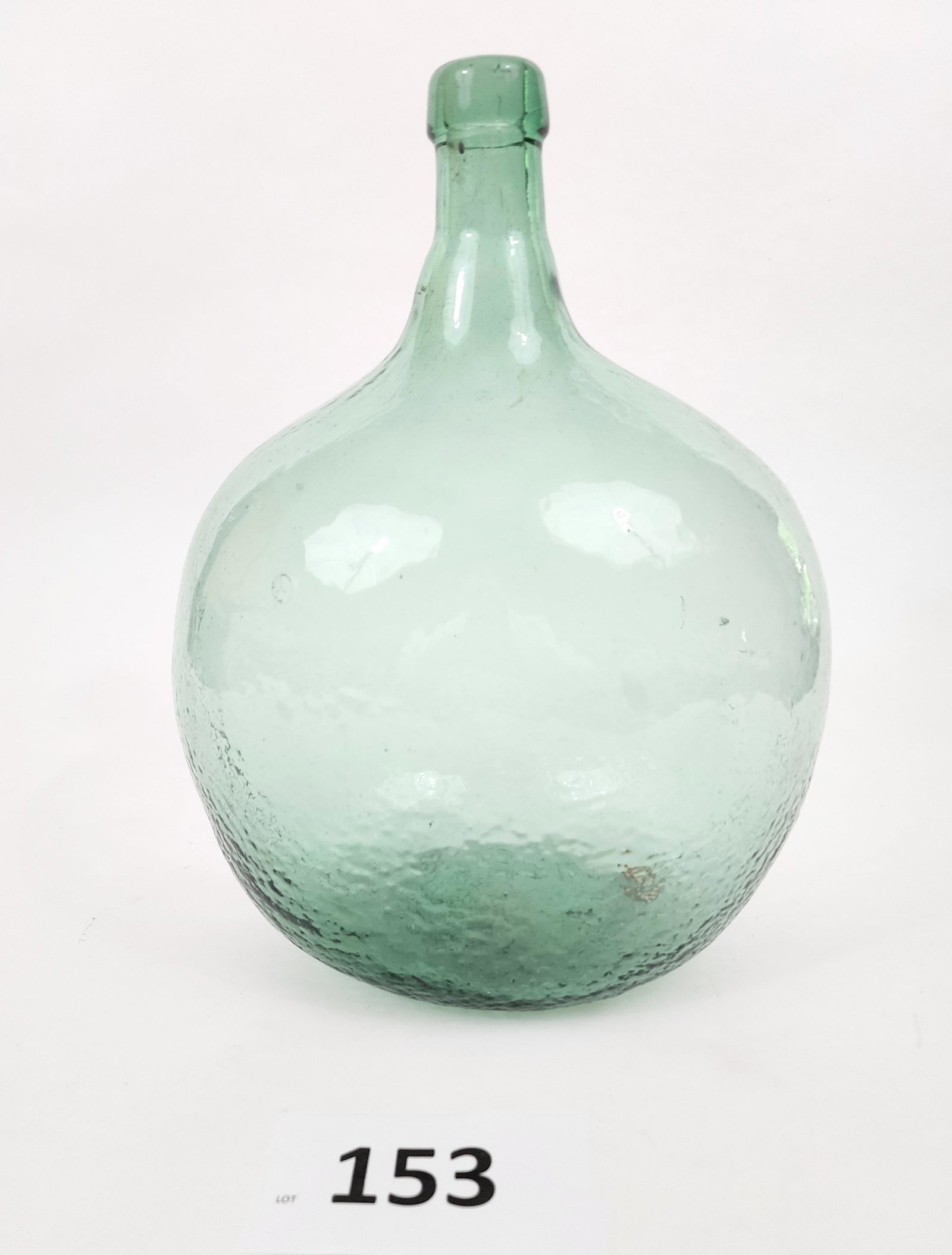 DEMIJOHN: 19th century. Molded aqua glass, with a tooled lip. 13.5" high.