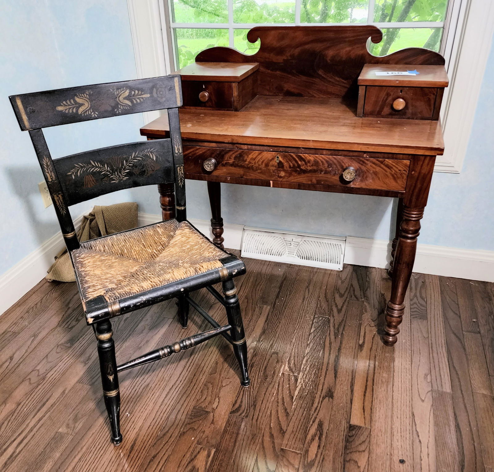 SHERATON DRESSING TABLE AND CHAIR: American, 1820-1840, walnut and poplar. Shaped backsplash with two small over one large drawer, on turned legs; the back is inscribed "Rochester NY" on the back, 36" high, 34" wide, 20" deep. Together