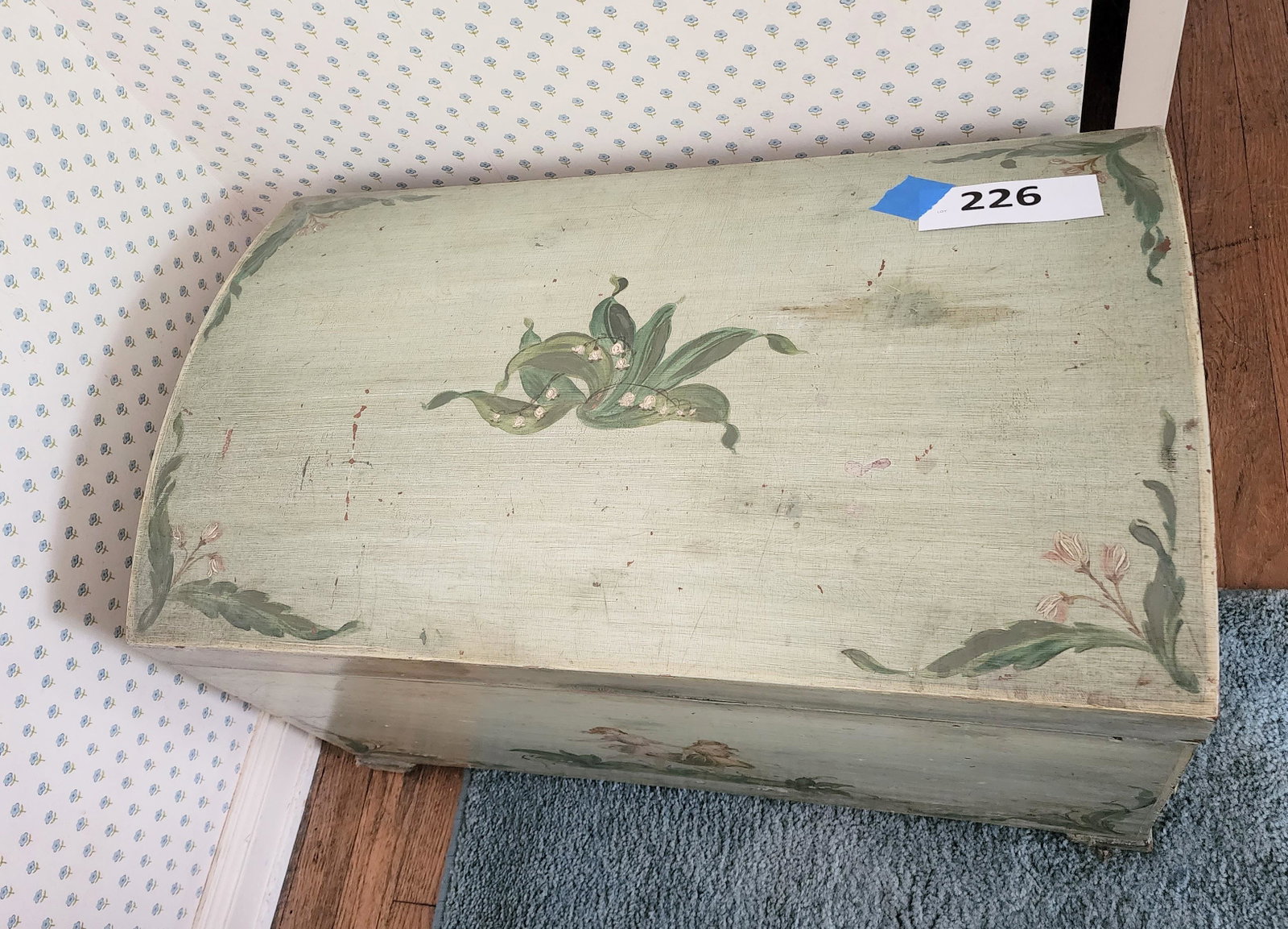DECORATED DOMETOP CHEST: 20th century. 17" high, 28" wide.