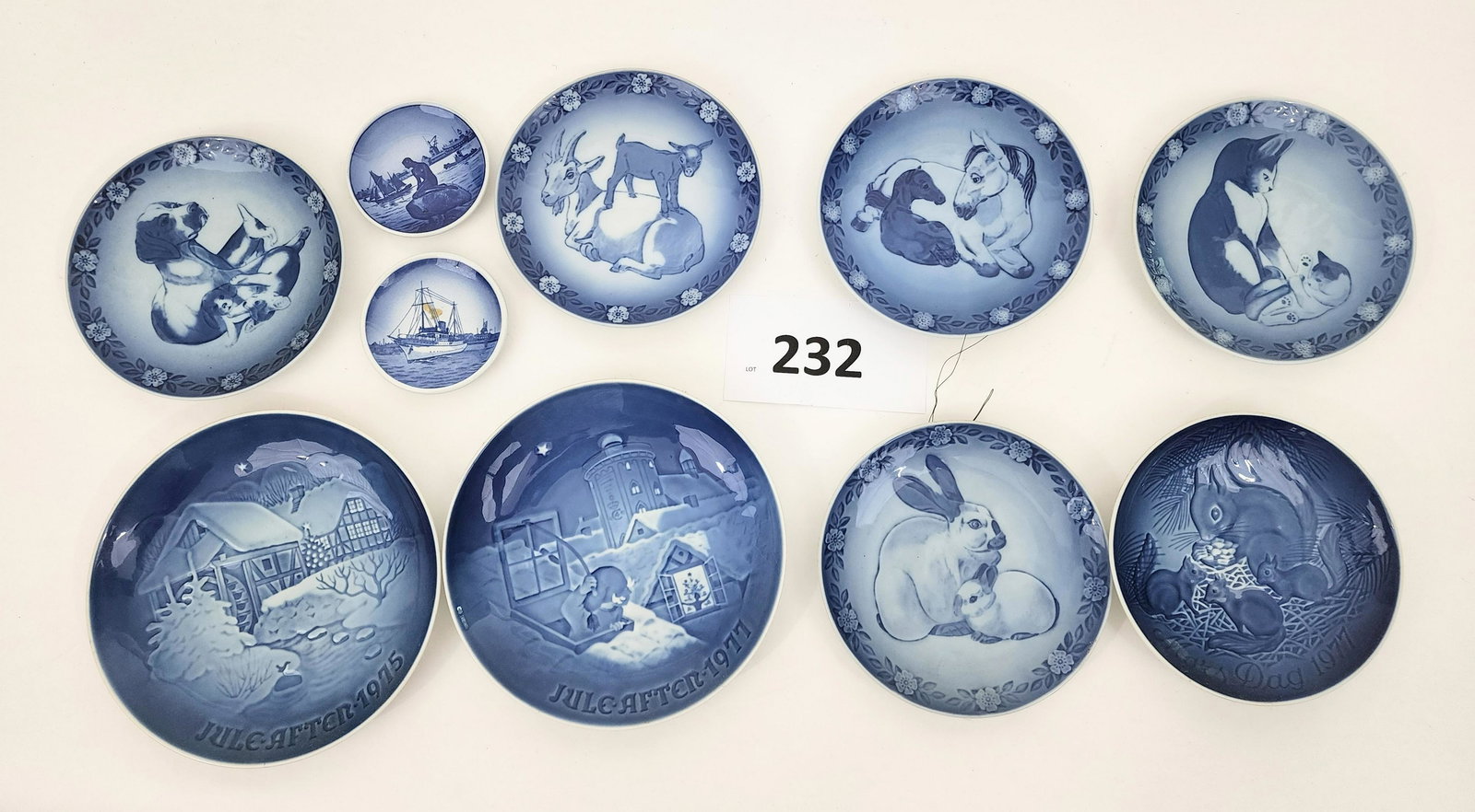 COLLECTION OF DANISH PLATES: 2 Bing and Grondahl scenic plates, 6 Royal Copenhagen plates with animals, and two "Denmark" butter pats with coastal scenes. B&G plates are 7.25" diameter.