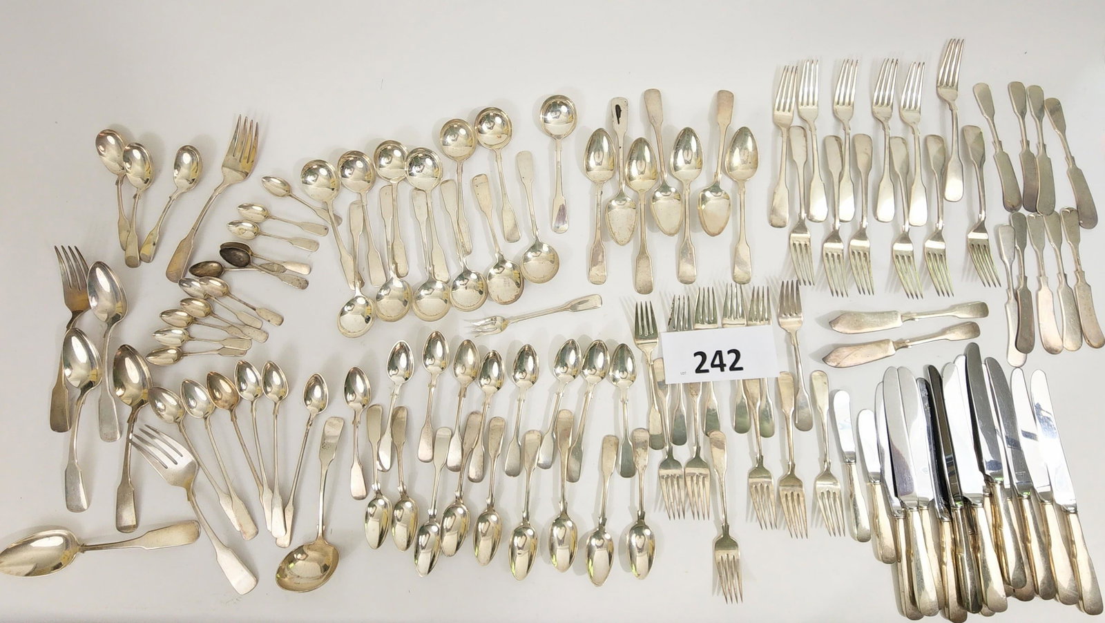 INTERNATIONAL SILVER COMPANY "1810" STERLING SILVER SERVICE: International Silver Company , Meriden, CT, 20th century. Service originally for 12 (incomplete) in the traditional fiddle back pattern. "1810" was introduced in 1930. Includes dinner knives (12) and 