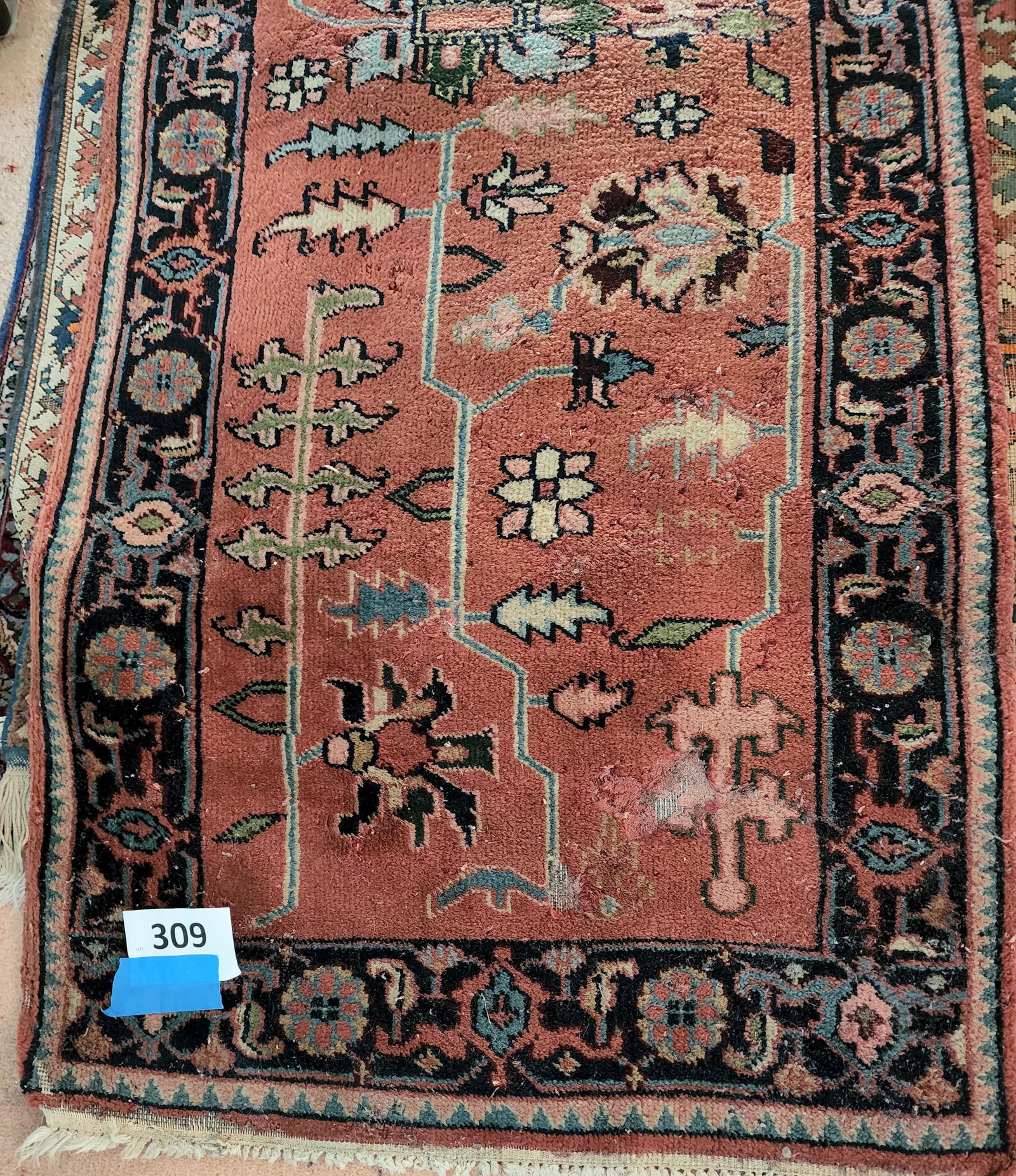 ORIENTAL RUNNER: Turkish, early-mid-20th century. Runner with rust field, blue border. Approx. 3' x 9.5'.