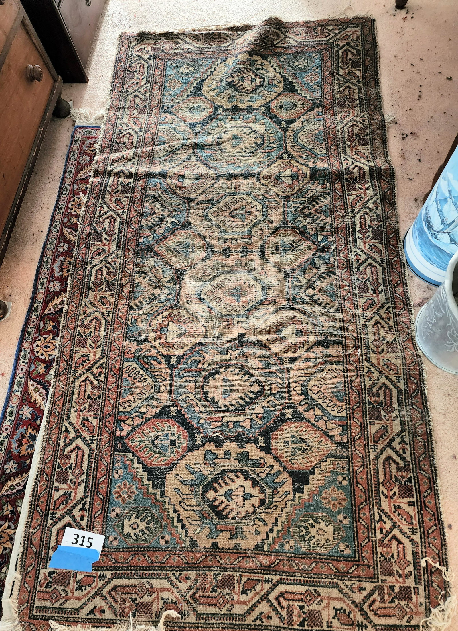 ORIENTAL RUNNER: Probably Turkish, 1st half-20th century. Runner in blue and rust. Approx. 3' x 6.5'.