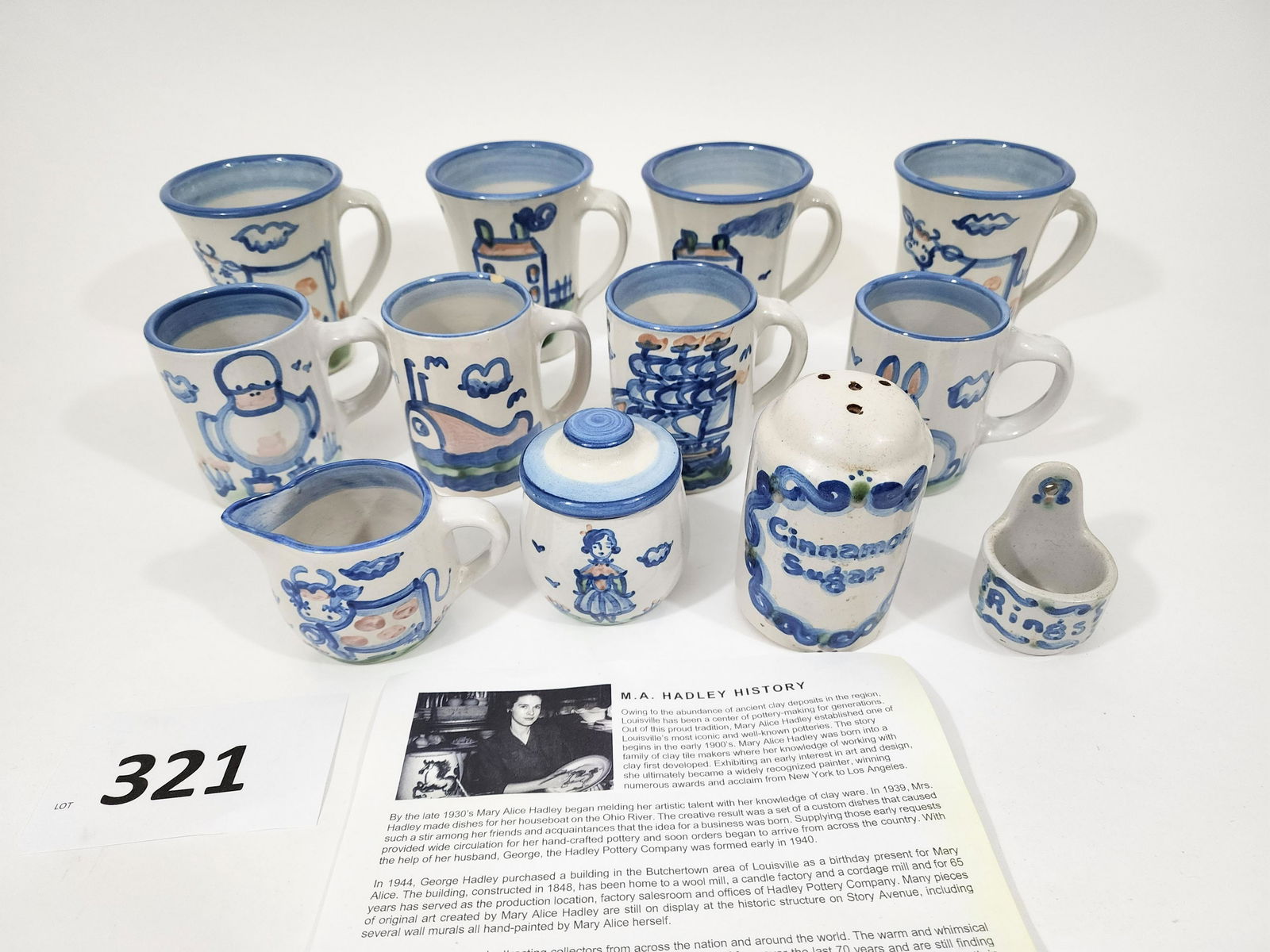MA HADLEY, LOUISVILLE, KENTUCKY, POTTERY: Louisville, KY, 20th/21st century. Mary Alice Hadley pottery (flourishing early 1900 - 1979) with mugs, cinnamon sugar, ring holder. The business was sold in 1979 to Mr. and Mrs. Kenneth W Moore of Lo