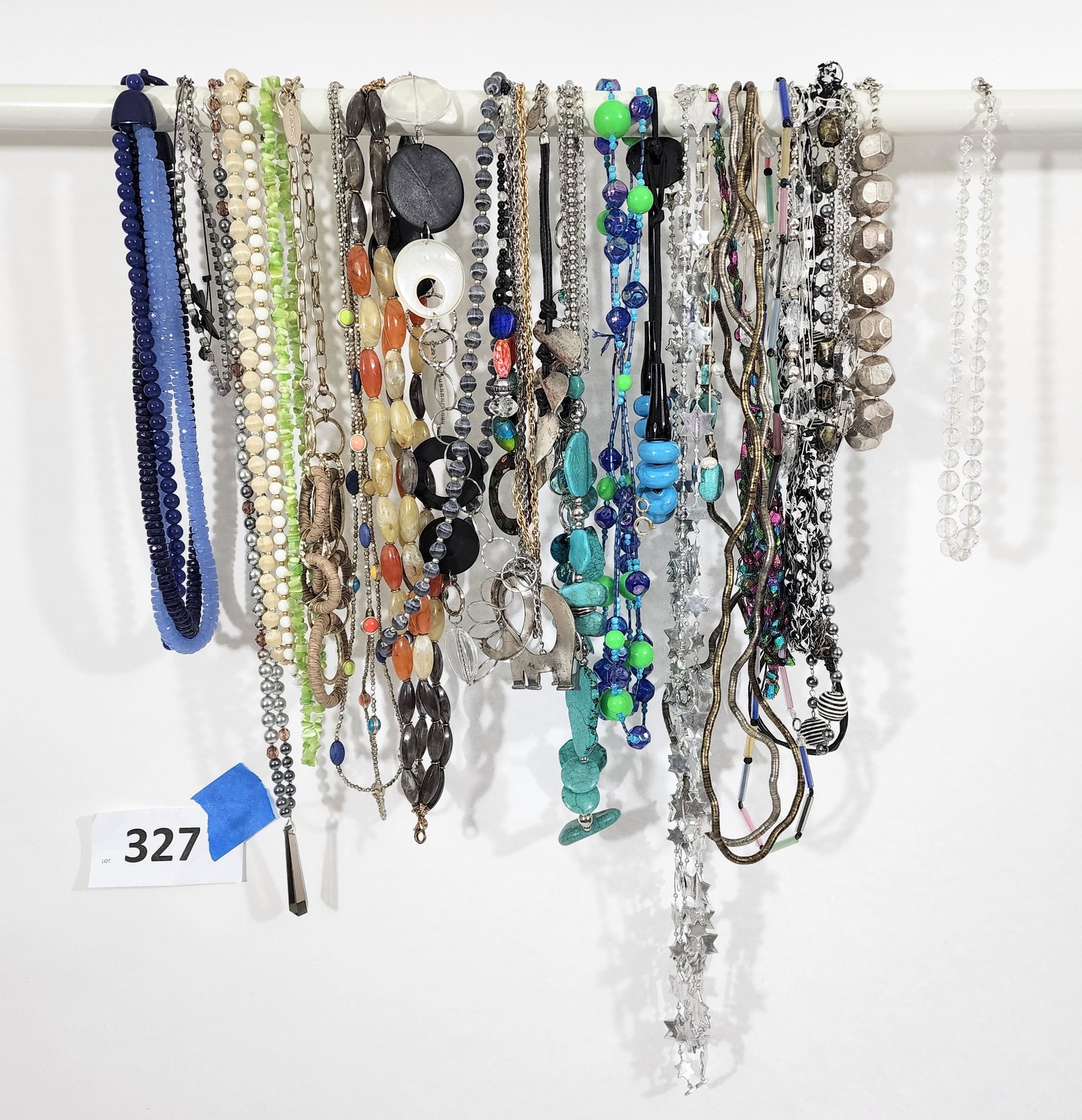 COSTUME NECKLACES: American, 20th century. Beaded and chain necklaces of varying lengths, includes some by Chicos.