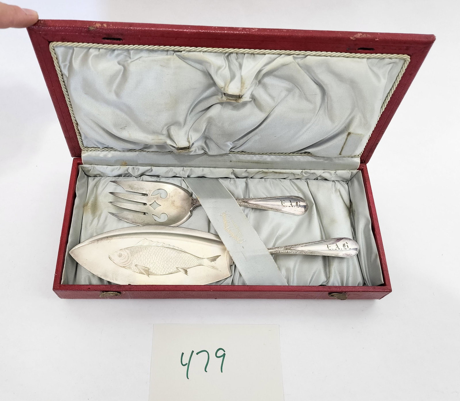 BOXED STERLING SILVER FISH SET OF SOUTHERN INTEREST: Gorham , Providence, RI, late 19th century. The fish knife with a finely engraved fish on the blade, and retaining the original box from Carrington Thomas and Co. , Charleston, South Carolina. Knife i