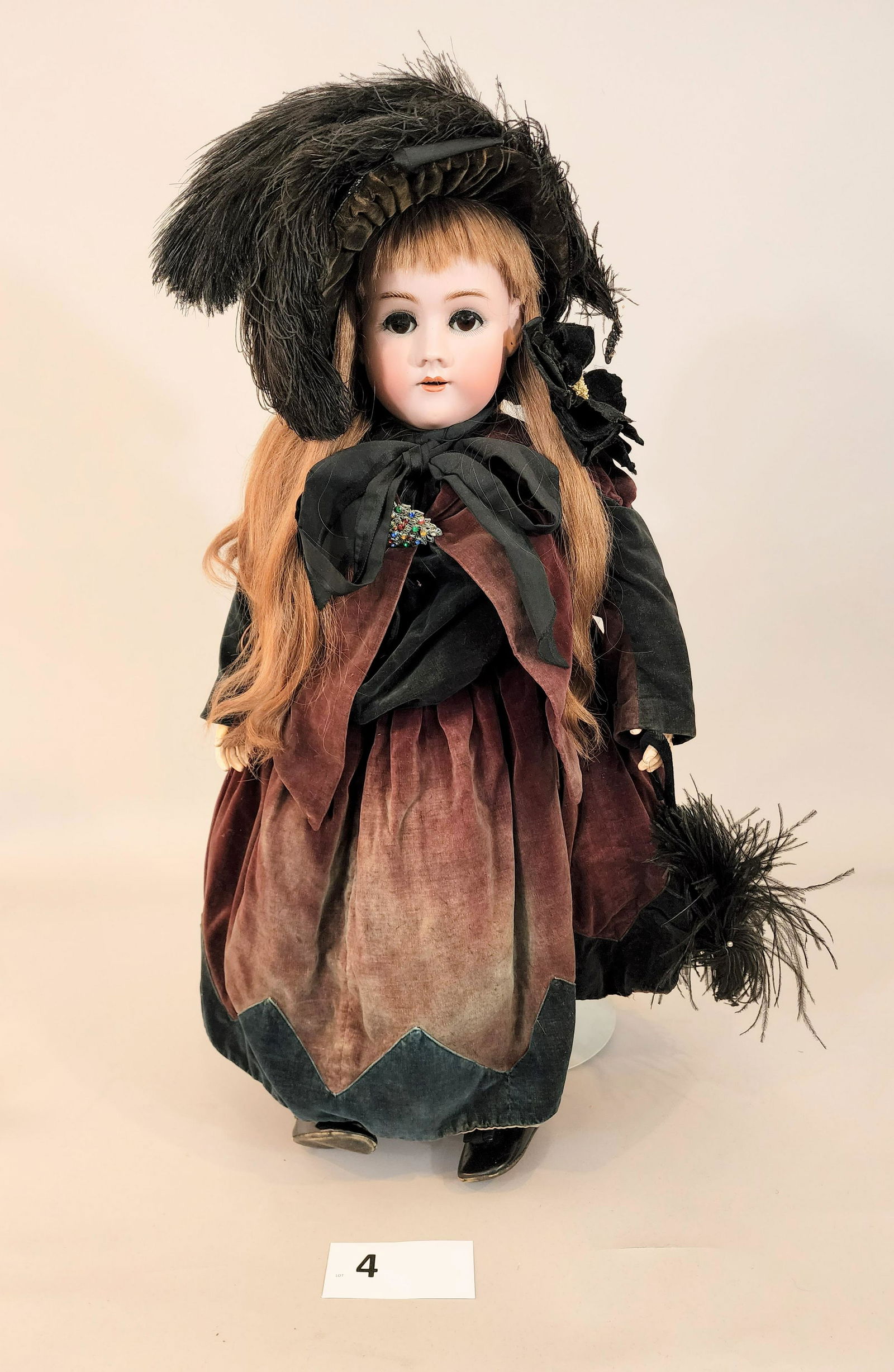 SIMON & HALBIG HEINRICH HANDWERCK 33" DOLL: Appears to be original burgundy and black velvet outfit with feathered hat and elaborate underclothes, black lace stockings and black leather shoes. Heinrich Handwerck bisque head and composition body