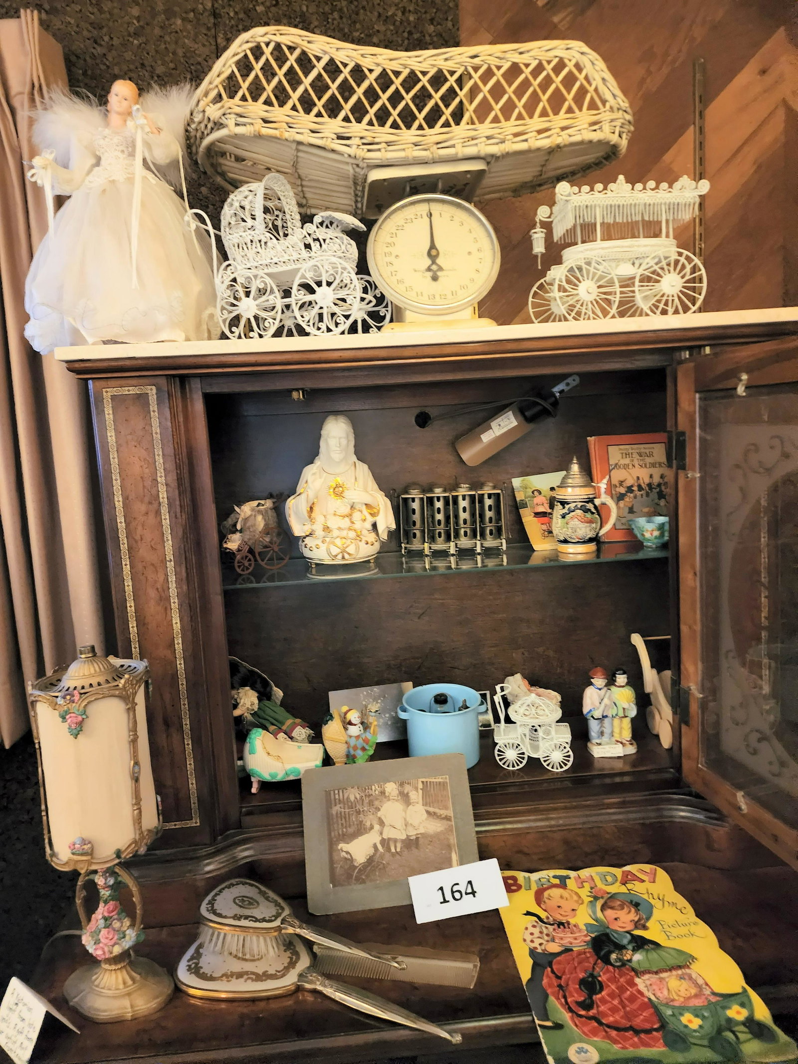 LARGE CUPBOARD CLEAN-OUT LOT: Includes vintage dolls, toys, and books, as well as dÃ©cor. 20
