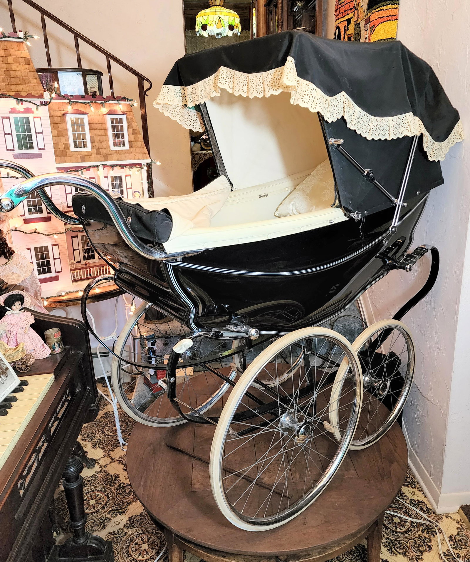 FINE SILVER CROSS PRAM: England. Silverdawne model, in exceptional condition. 54" long.
